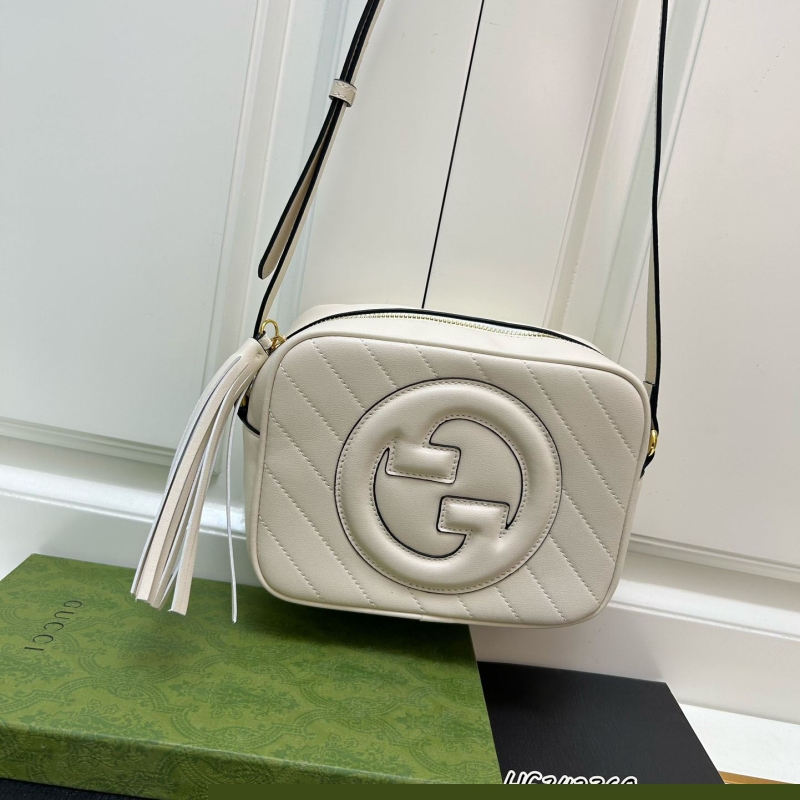G*u*i satchel bags